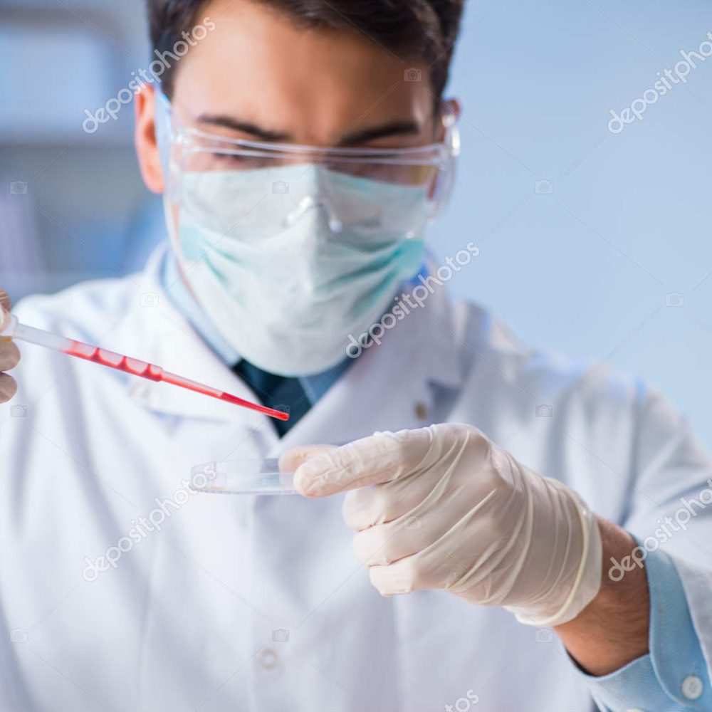 Lab assistant testing blood samples in hospital